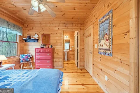 a bathroom with a sink a toilet and bathtub