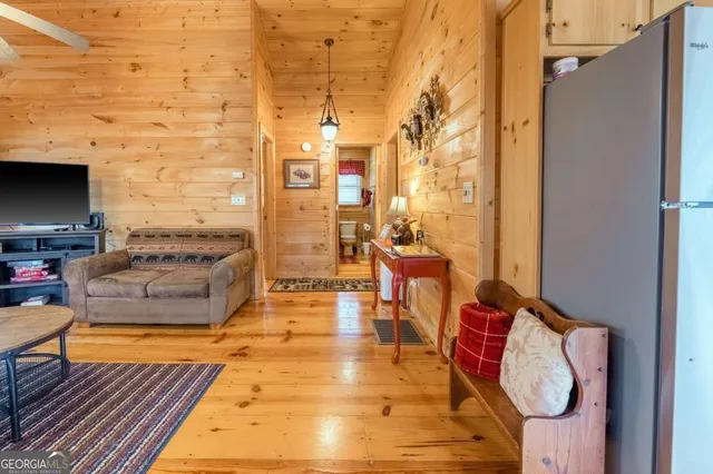 a swimming pool with outdoor seating