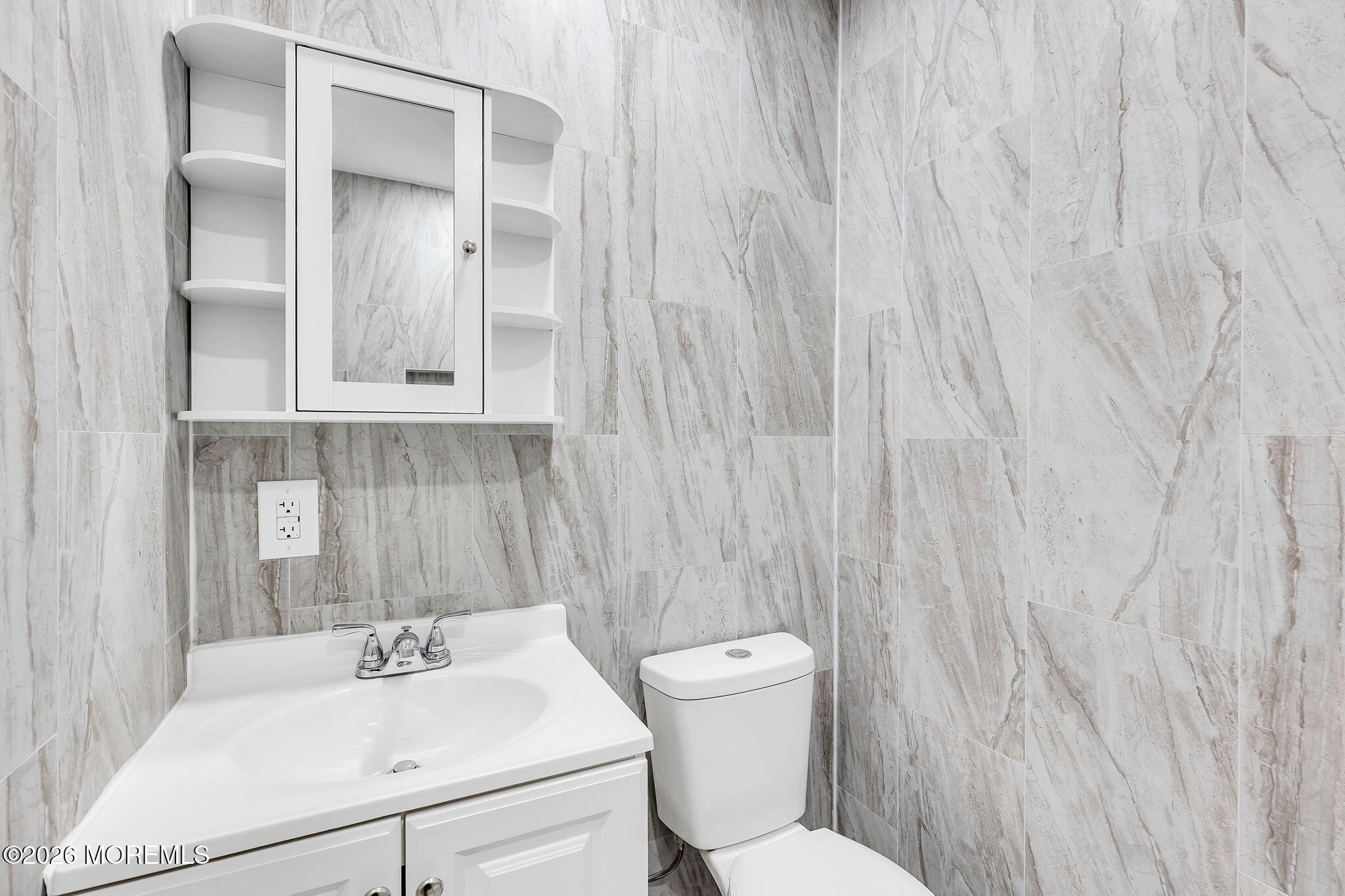 50 Westbrook Road Howell, NJ 07731 - Photo 46 of 73 a bathroom with a sink toilet and vanity