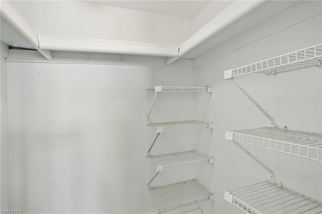 170 Turtle Lake Court, Unit 301 Naples, FL 34105 - Photo 14 of 23 a walk in closet
