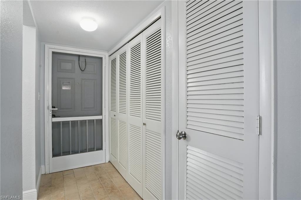 170 Turtle Lake Court, Unit 301 Naples, FL 34105 - Photo 22 of 23 a view of a livingroom and an empty space