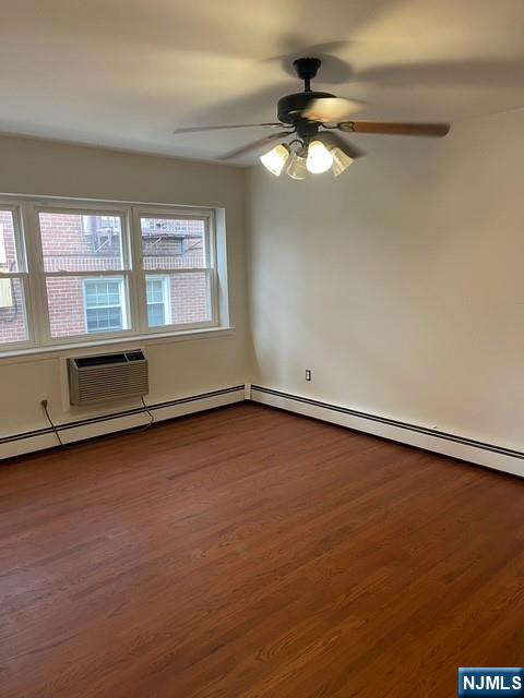 279 Chestnut Street Nutley, NJ 07110 - Photo 1 of 9 wooden floor in an empty room with a window