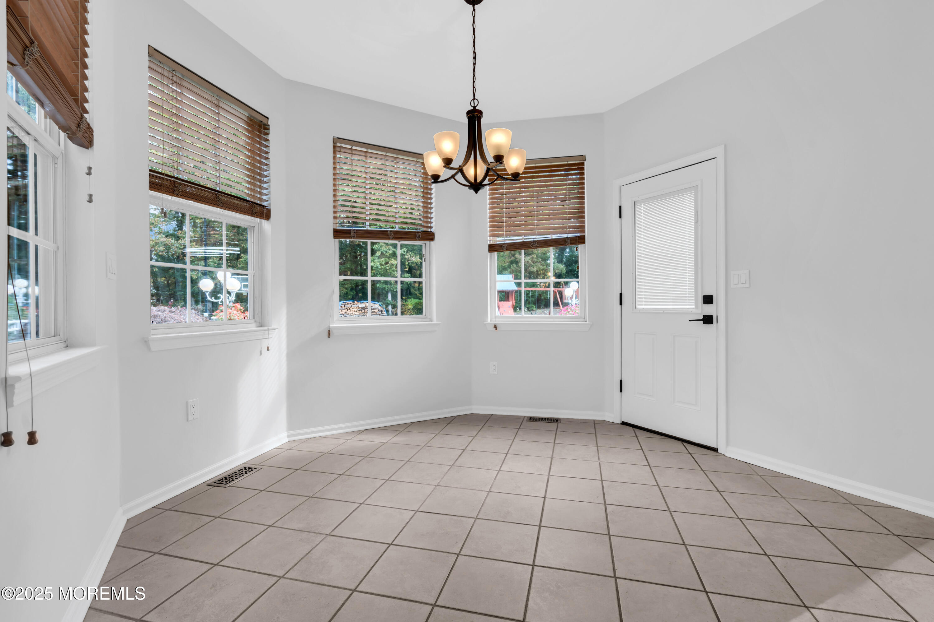 3 Wellesly Court Jackson, NJ 08527 - Photo 13 of 35 a view of an empty room with a window