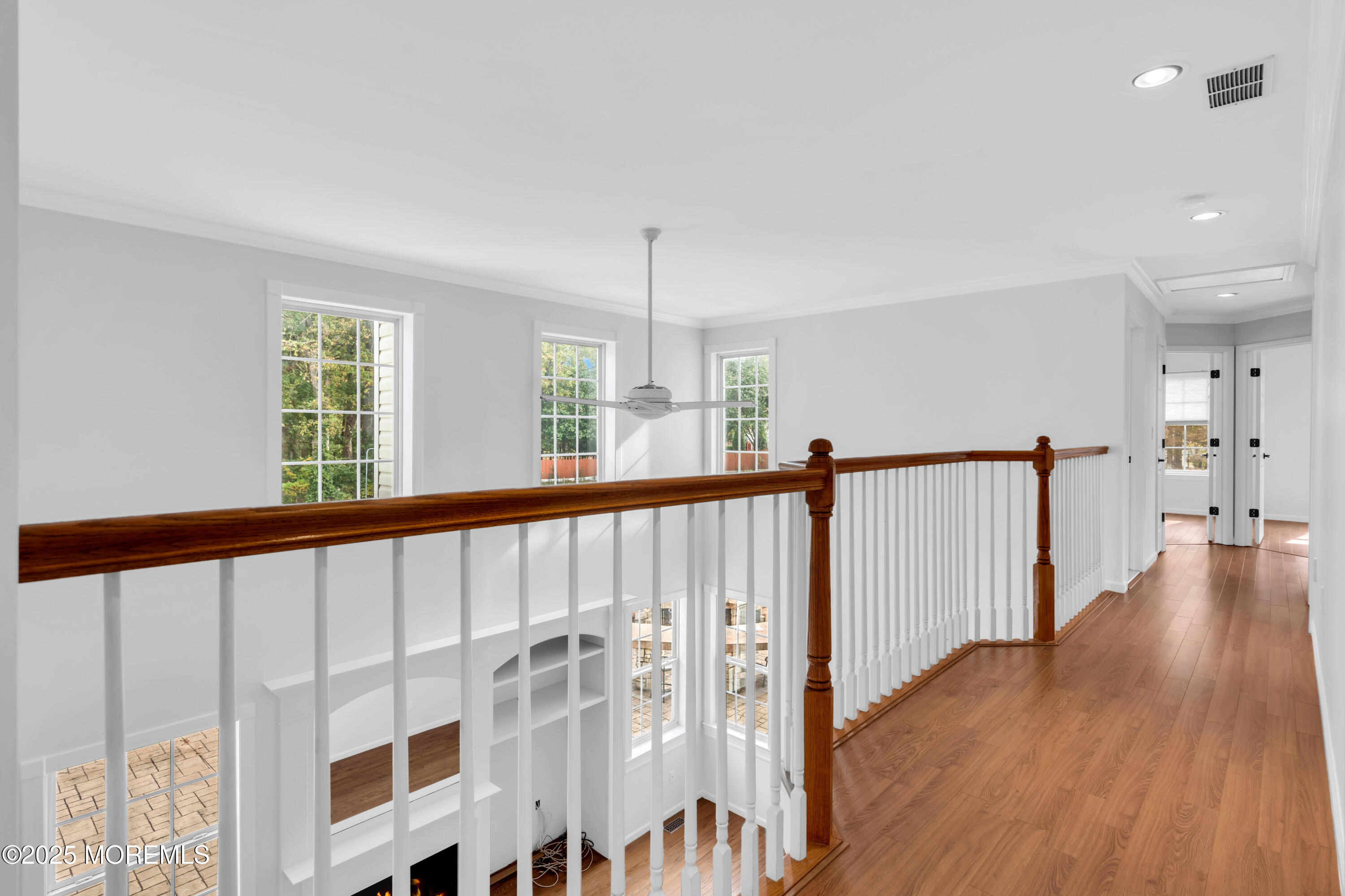 3 Wellesly Court Jackson, NJ 08527 - Photo 19 of 35 a view of a hallway with wooden floor and windows