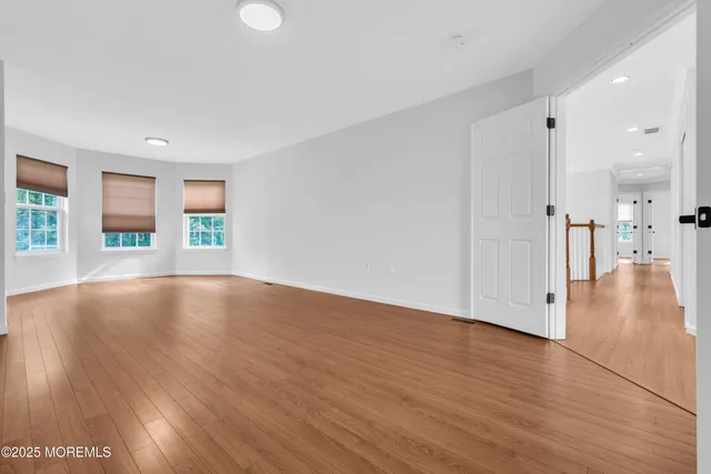 a view of livingroom with hardwood floor and window