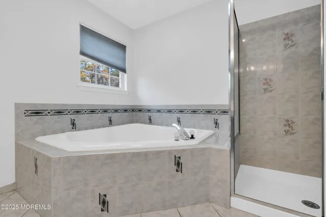 a bathroom with a sink and a shower