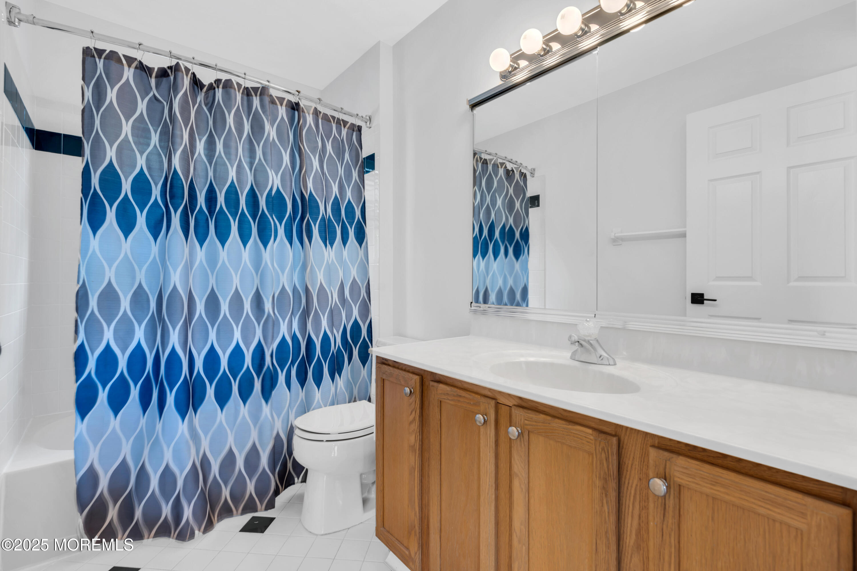 3 Wellesly Court Jackson, NJ 08527 - Photo 28 of 35 a bathroom with a sink a toilet and a mirror