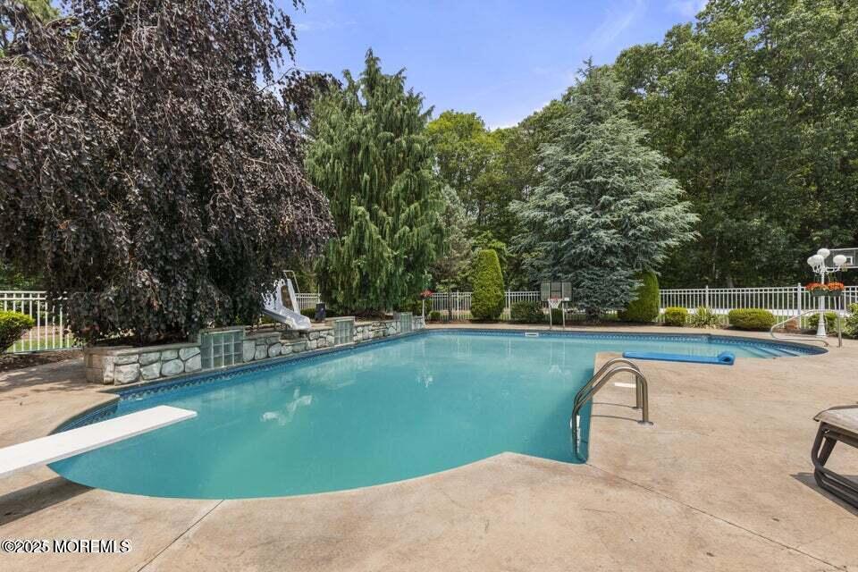 3 Wellesly Court Jackson, NJ 08527 - Photo 33 of 35 a view of a swimming pool with a patio