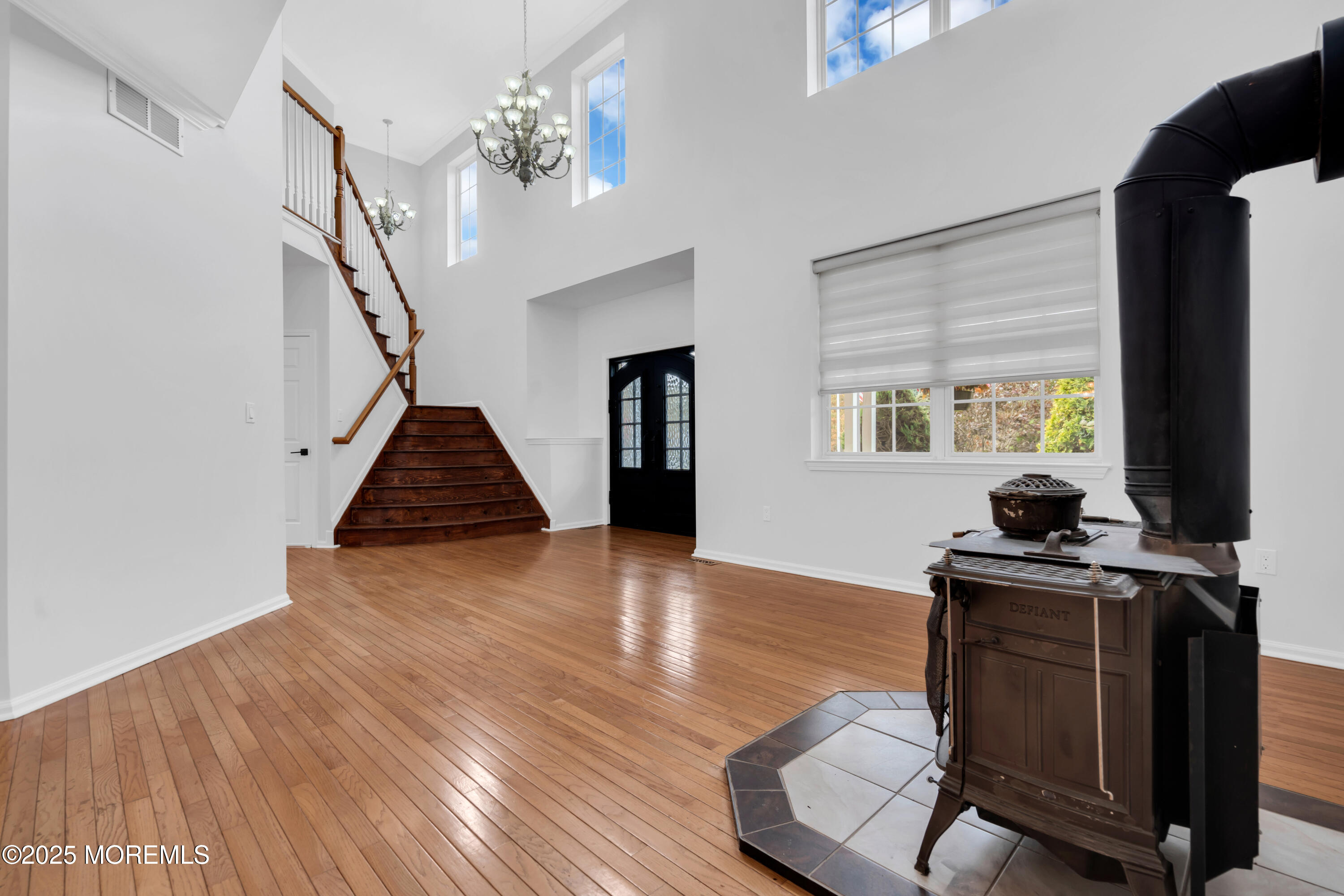 3 Wellesly Court Jackson, NJ 08527 - Photo 6 of 35 a view of a livingroom with furniture hardwood floor and staircase