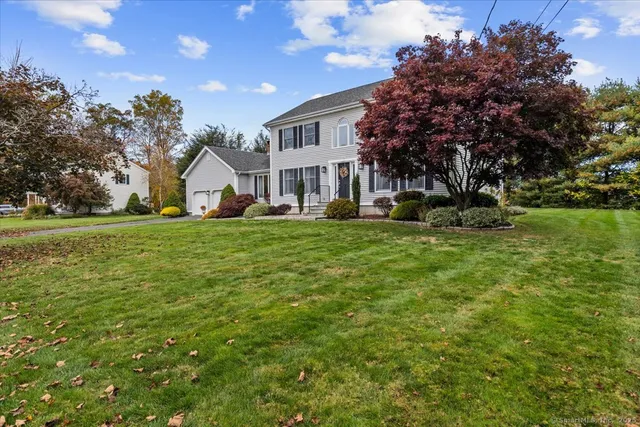 a view of a house with a big yard