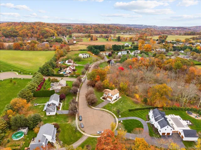 an aerial view of a house with a outdoor space