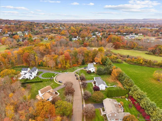an aerial view of a houses with outdoor space