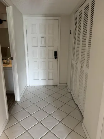 a view of washer and dryer with wooden floor