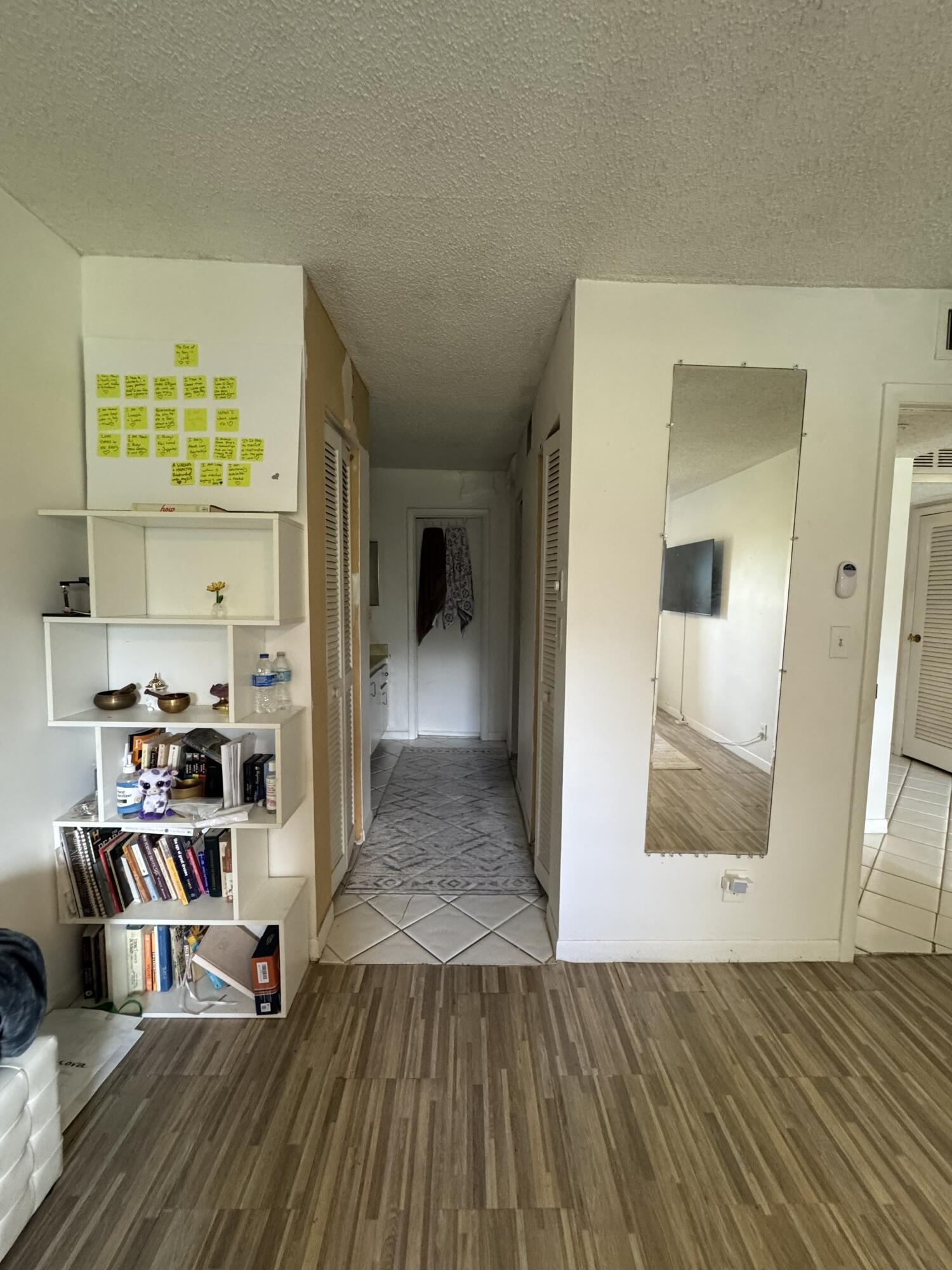 5961 North Falls Cir Drive, Unit 306 Lauderhill, FL 33319 - Photo 10 of 16 a view of a living room with furniture and wooden floor