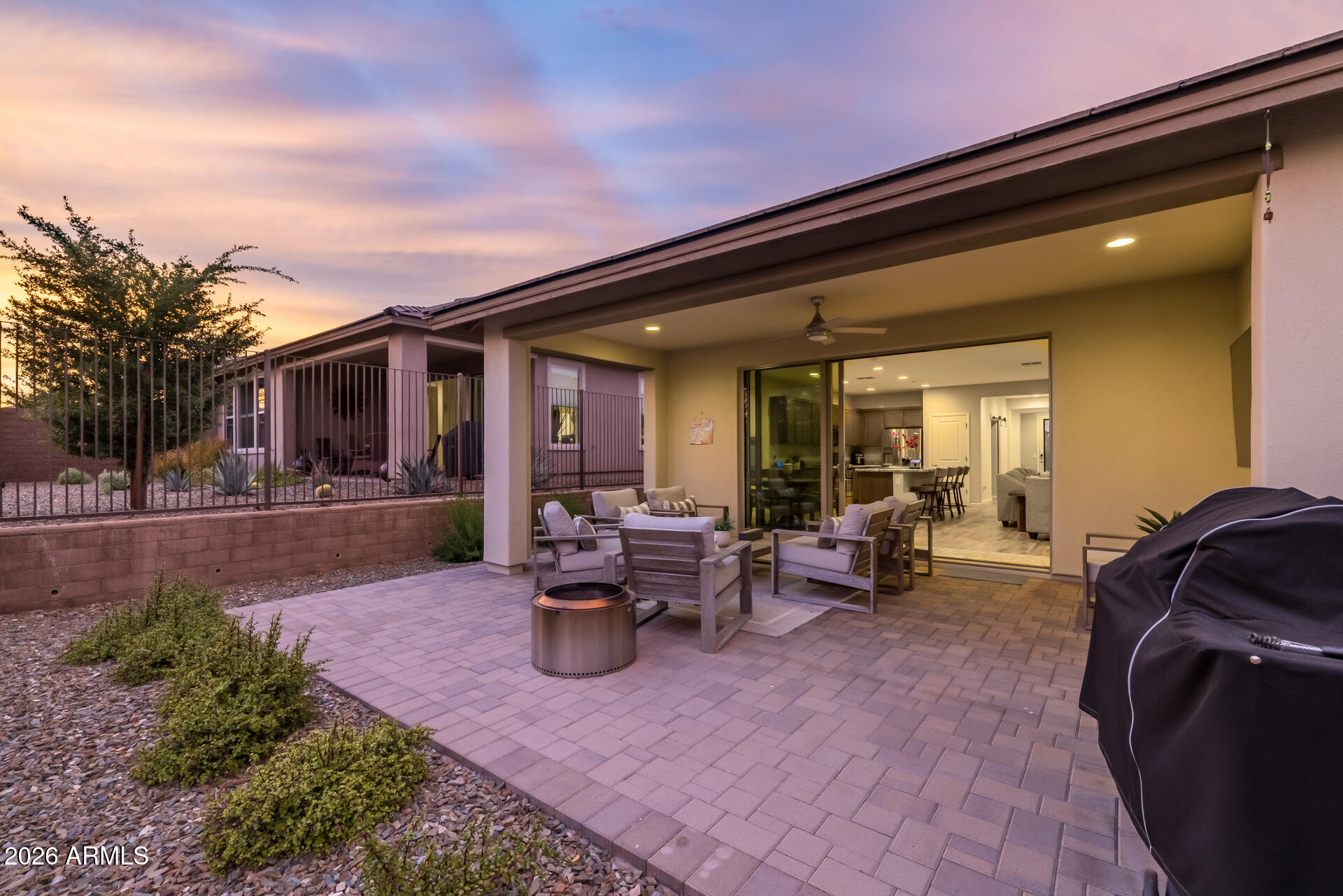 17443 East Cindercone Road Rio Verde, AZ 85263 - Photo 30 of 70 a view of the patio with chairs and tables