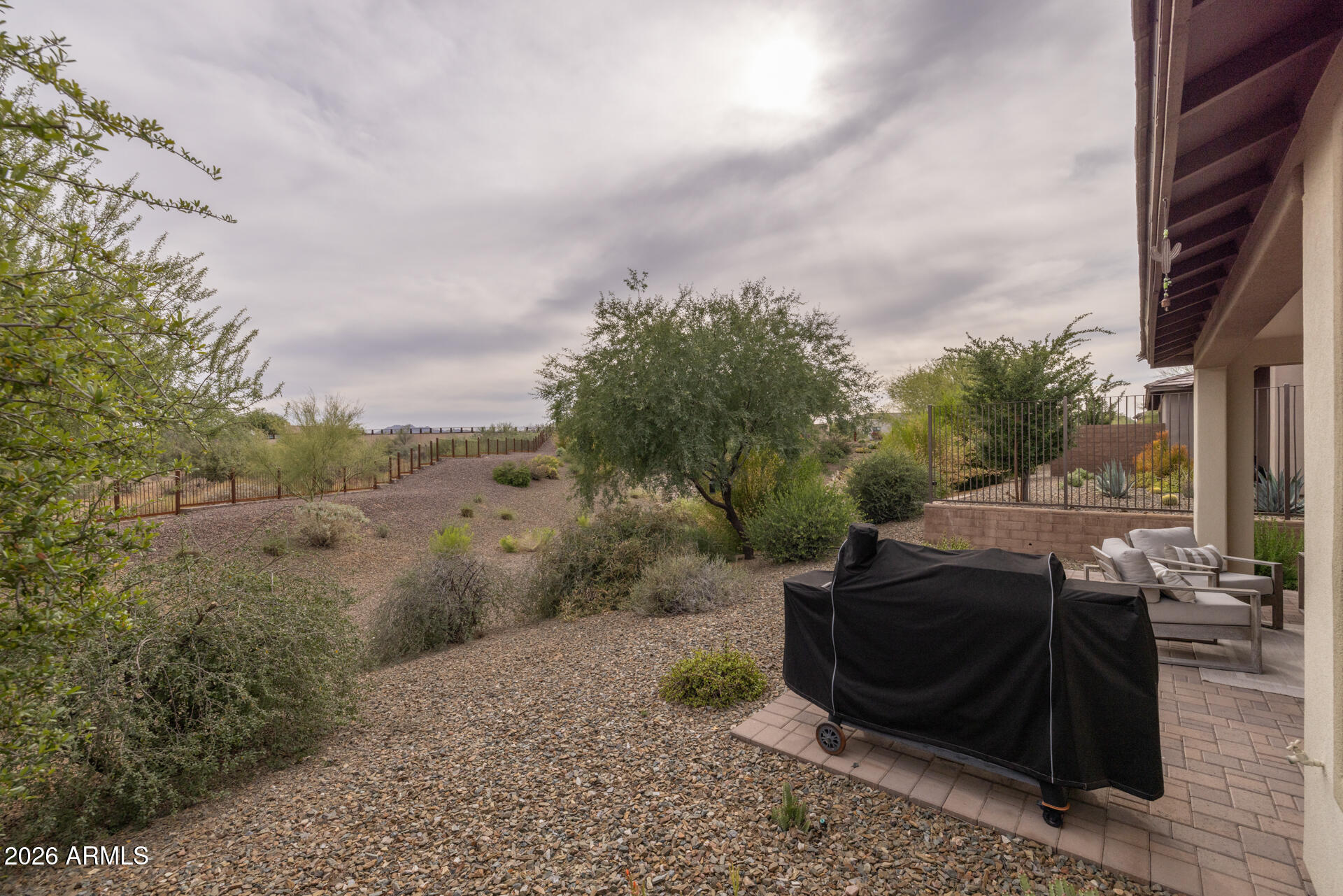 17443 East Cindercone Road Rio Verde, AZ 85263 - Photo 43 of 70 a view of backyard with barbeque grill and outdoor seating