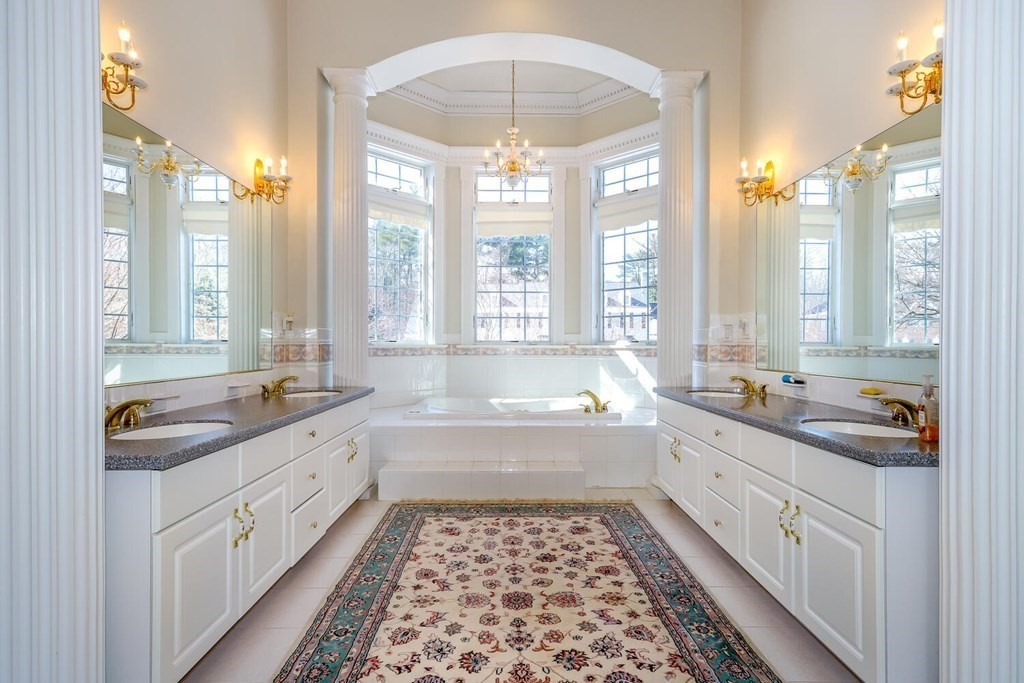 12 Cherokee Road Canton, MA 02021 - Photo 19 of 39 a large white kitchen with a large window