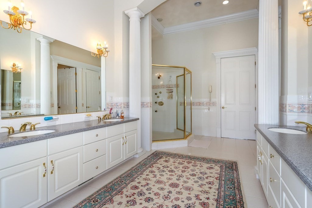 12 Cherokee Road Canton, MA 02021 - Photo 20 of 39 a spacious bathroom with double sink and a mirror