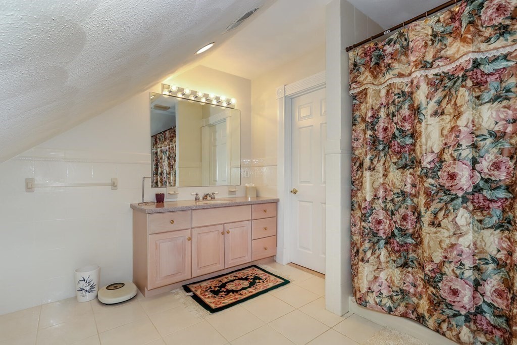 12 Cherokee Road Canton, MA 02021 - Photo 28 of 39 a spacious bathroom with a sink toilet and shower