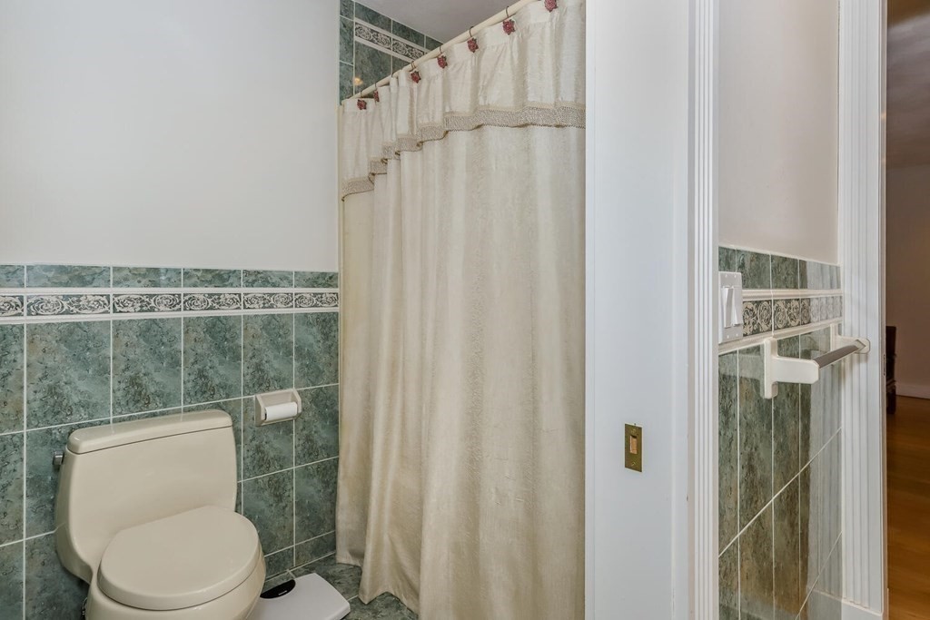 12 Cherokee Road Canton, MA 02021 - Photo 32 of 39 a bathroom with a toilet and a shower