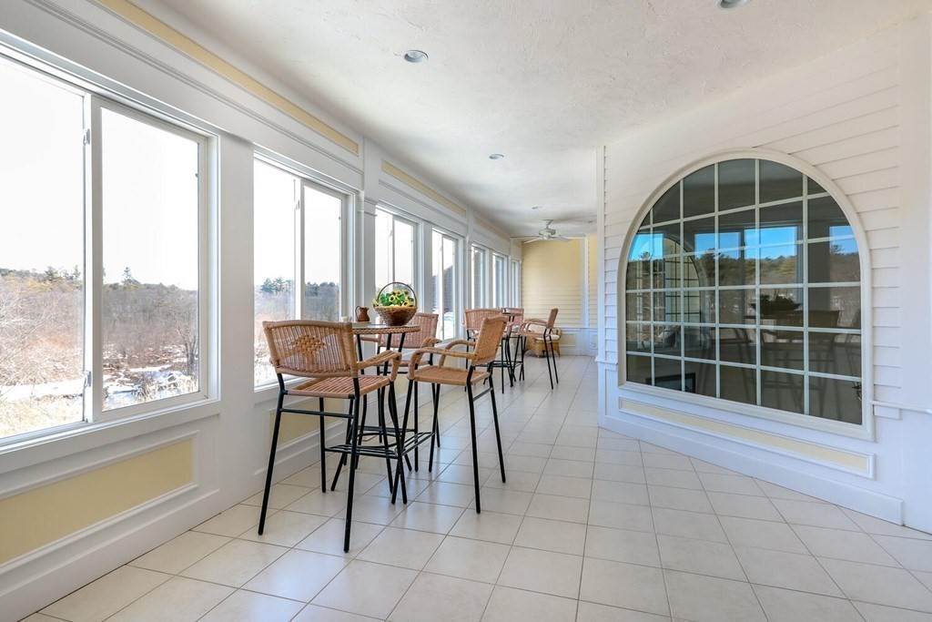 12 Cherokee Road Canton, MA 02021 - Photo 38 of 39 a view of a dining room with furniture window and outside view
