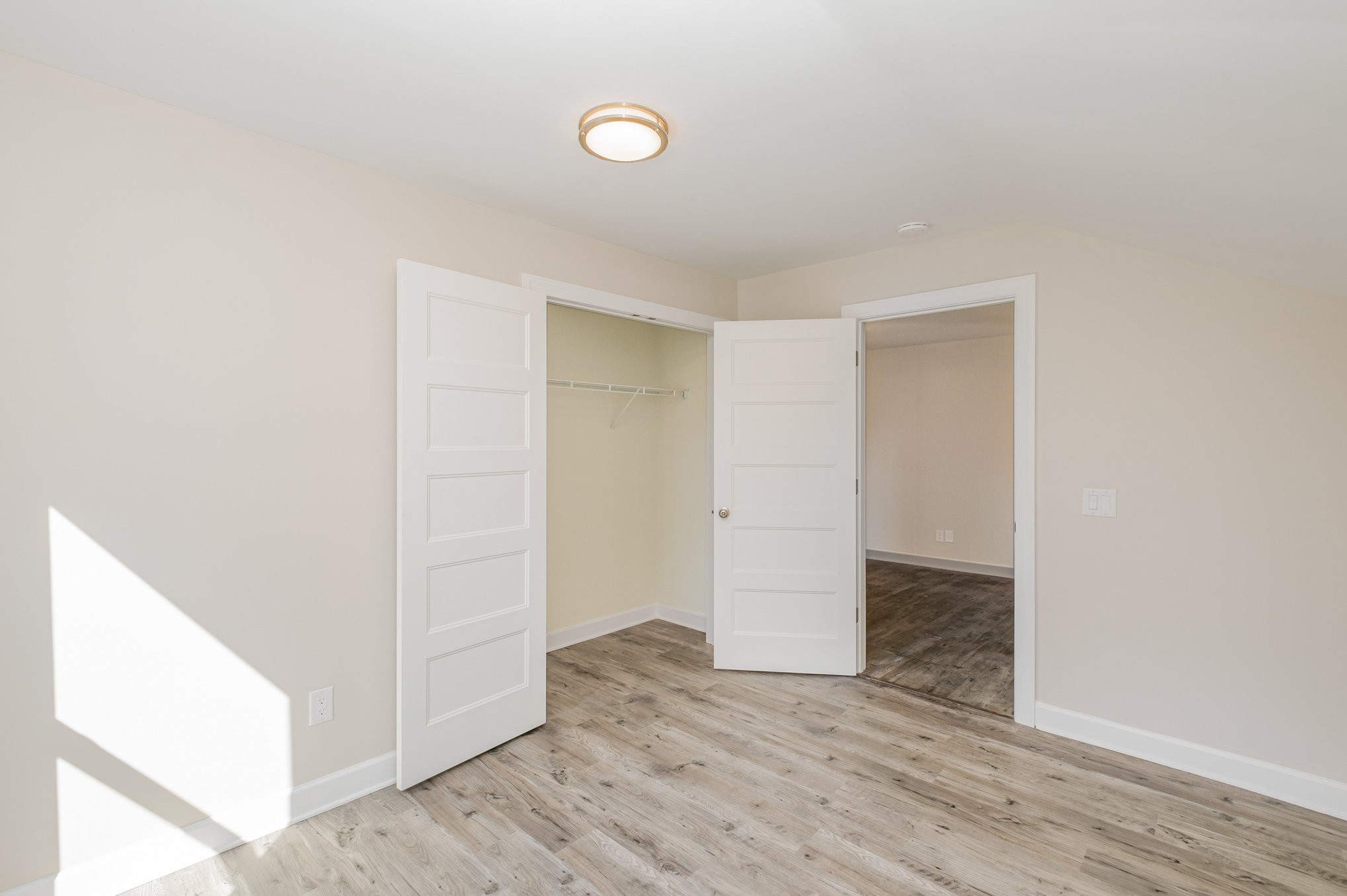 417 West Coffee Street Tullahoma, TN 37388 - Photo 17 of 34 an empty room with wooden floor