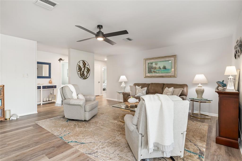 774 Spring Lake Boulevard Northwest Port Charlotte, FL 33952 - Photo 5 of 29 a living room with furniture and a window