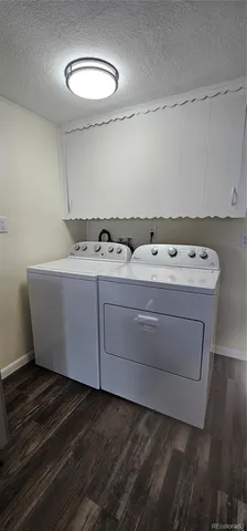a utility room with washer and dryer