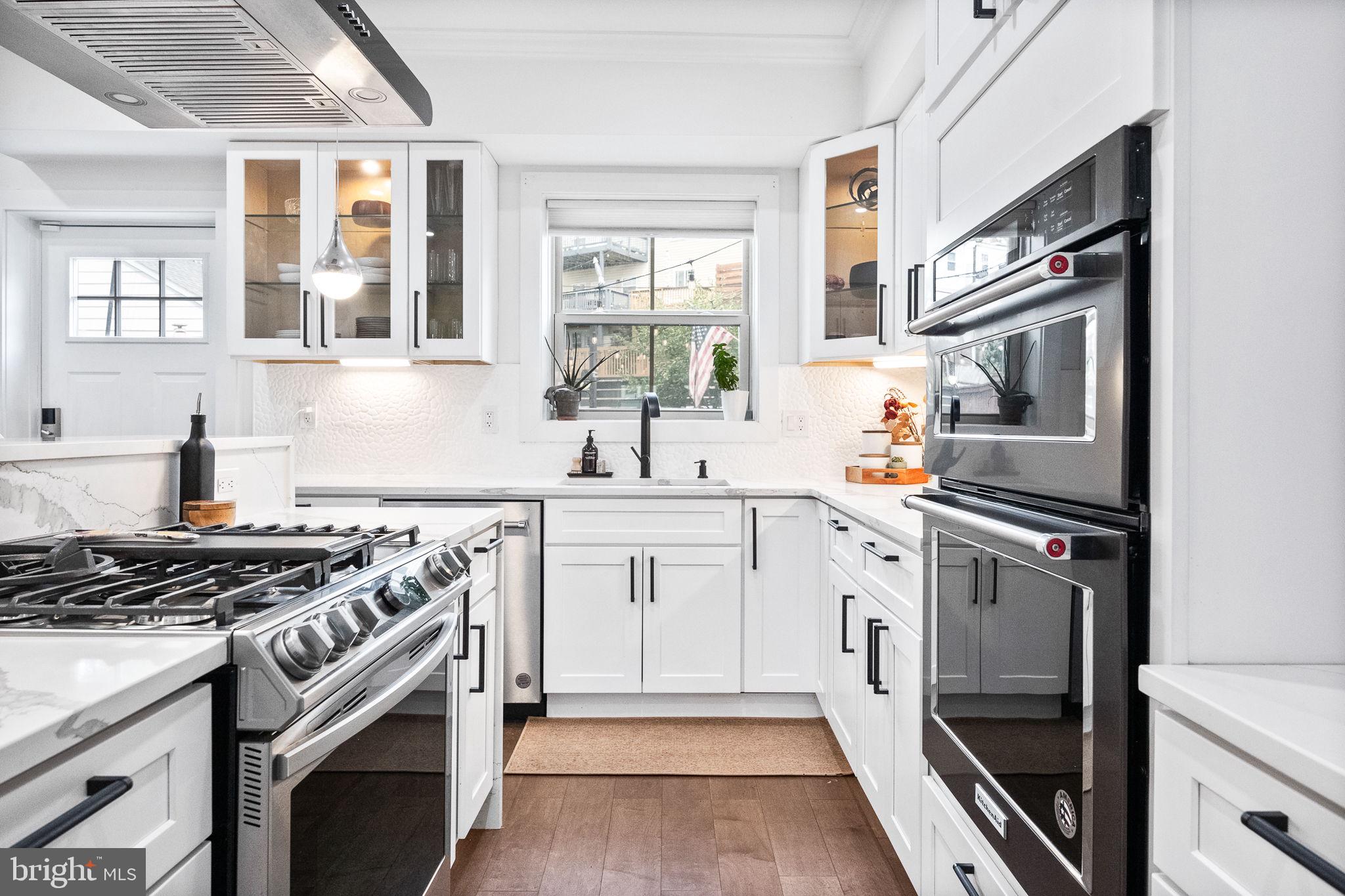 4625 4th Street Northwest Washington, DC 20011 - Photo 11 of 41 a kitchen with a stove oven and sink