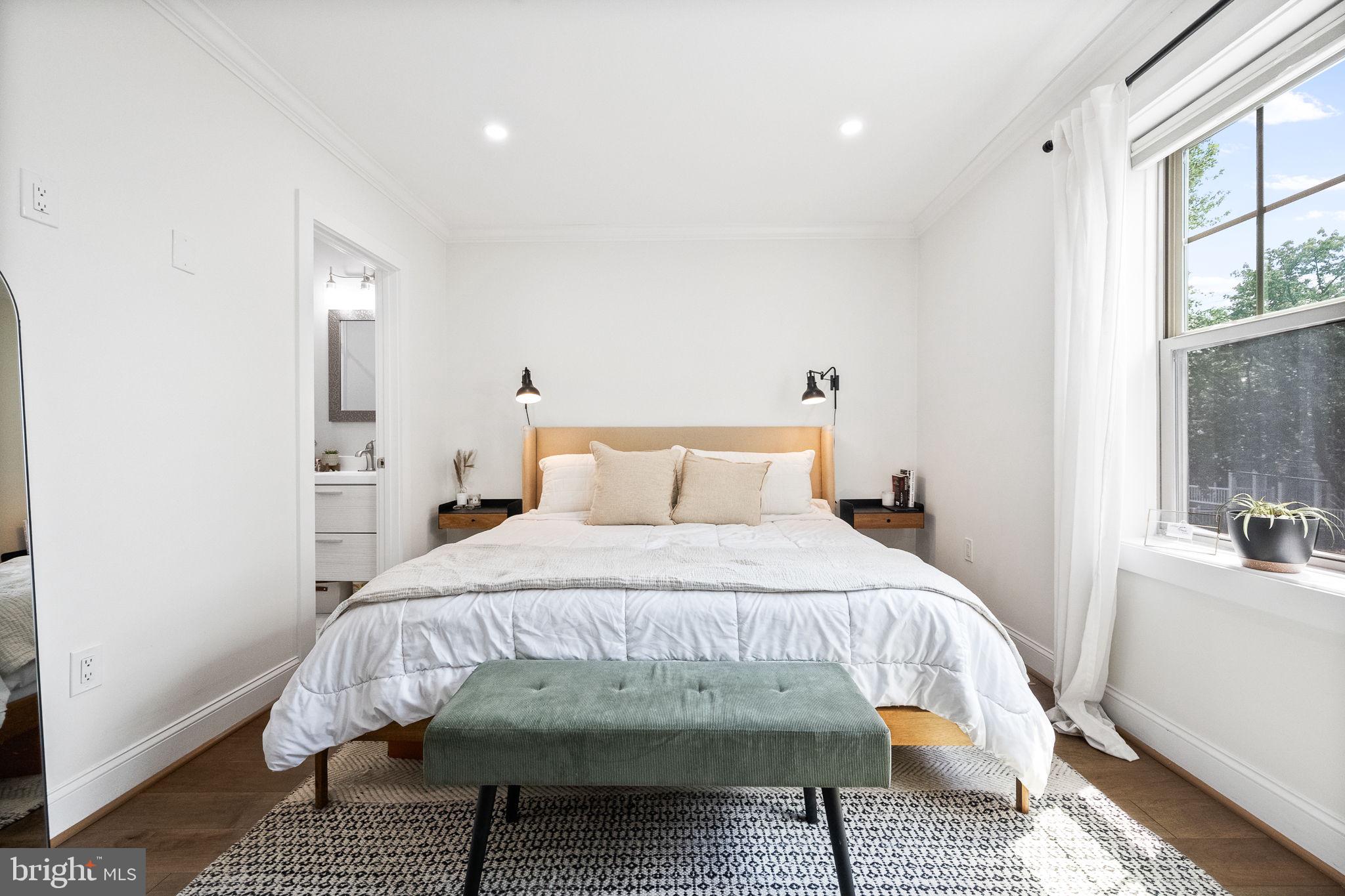 4625 4th Street Northwest Washington, DC 20011 - Photo 18 of 41 a bedroom with a bed and window