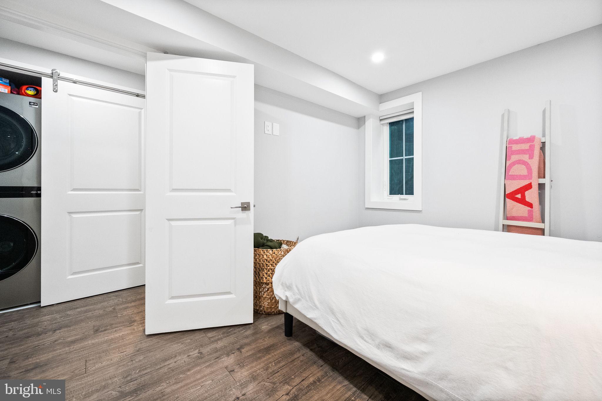 4625 4th Street Northwest Washington, DC 20011 - Photo 32 of 41 a bedroom with a bed and a window