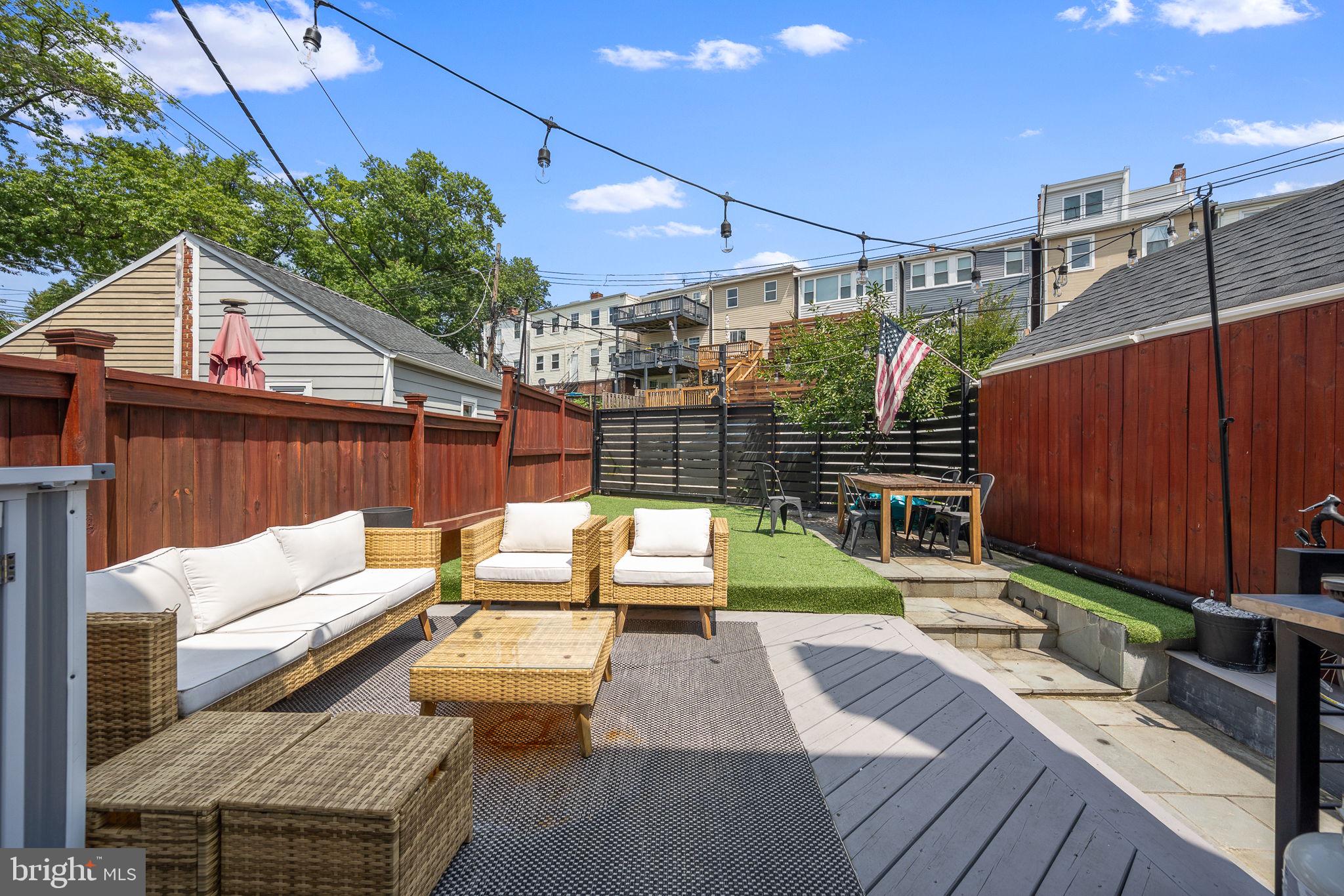 4625 4th Street Northwest Washington, DC 20011 - Photo 36 of 41 a view of a deck with couches table and chairs
