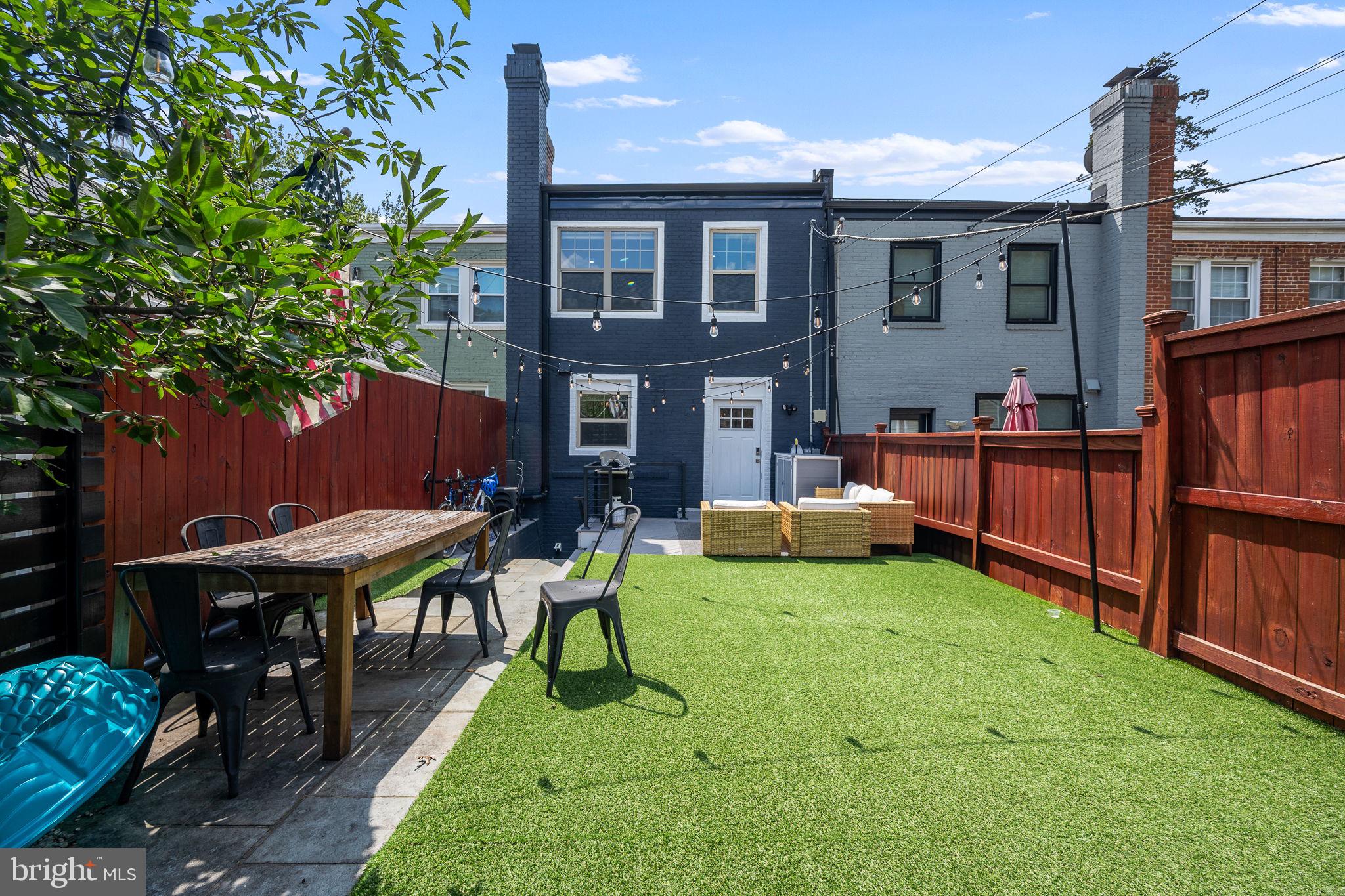 4625 4th Street Northwest Washington, DC 20011 - Photo 38 of 41 a view of a house with backyard porch and sitting area