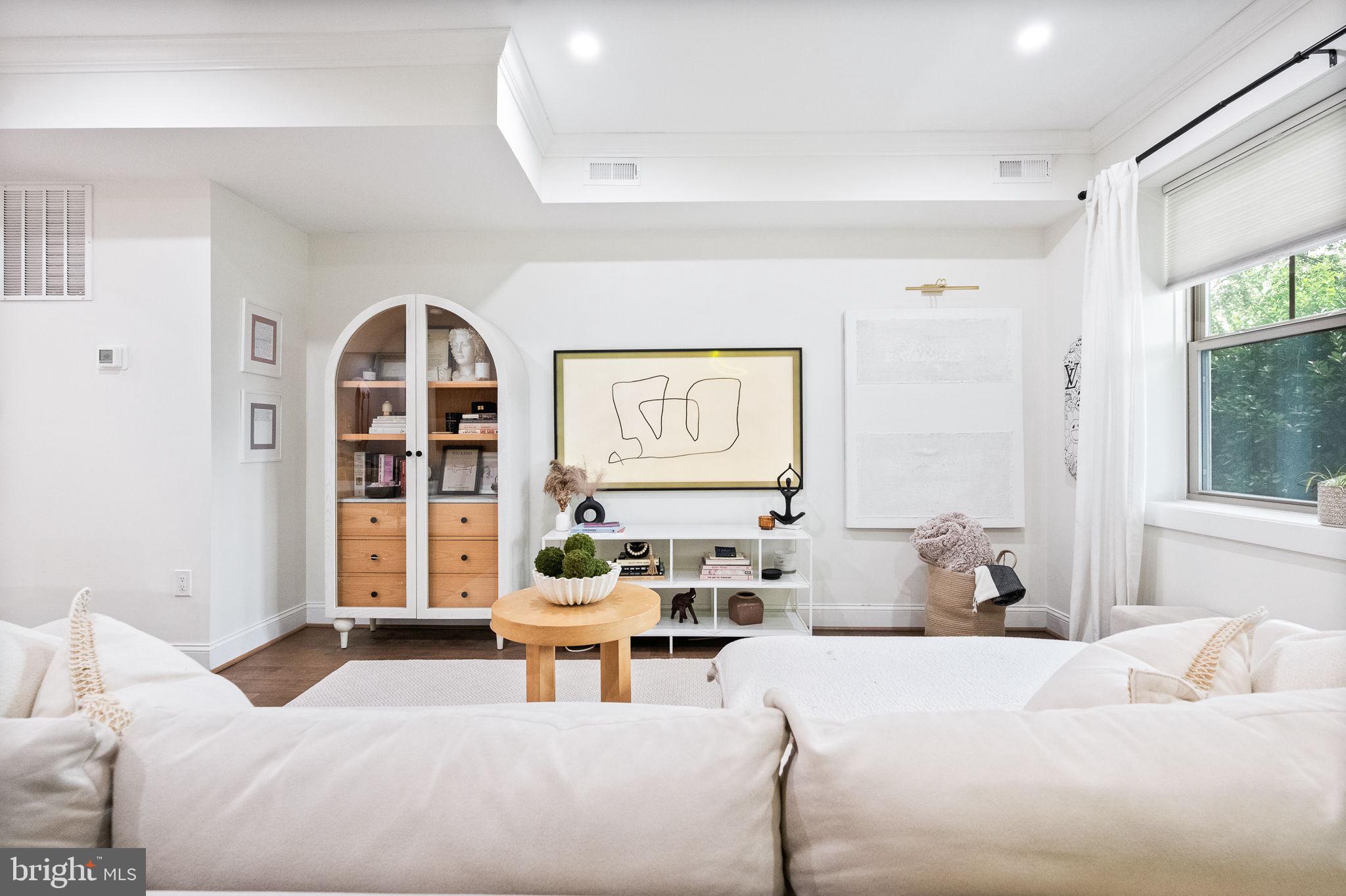 4625 4th Street Northwest Washington, DC 20011 - Photo 4 of 41 a bedroom with furniture and a window