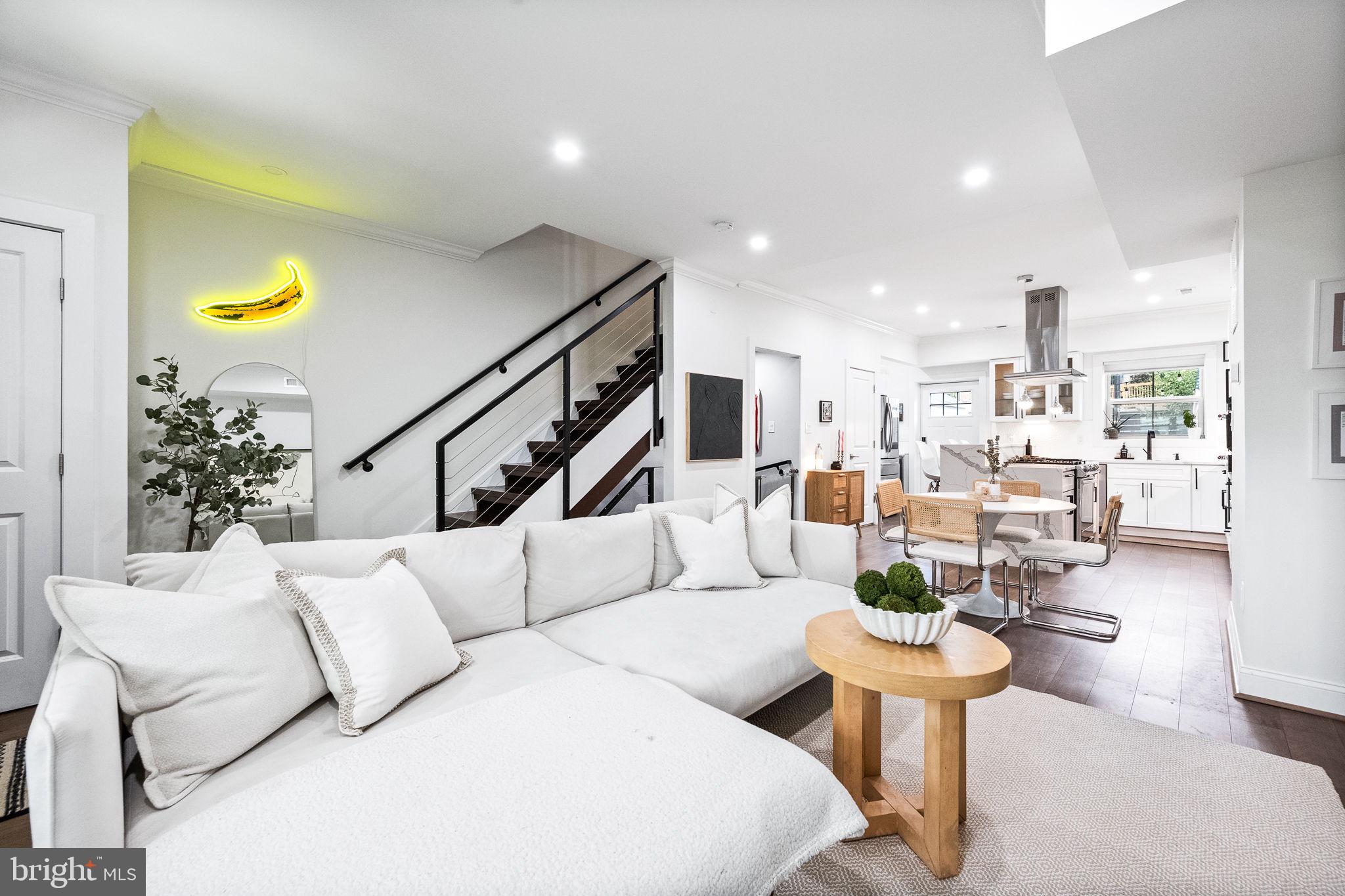 4625 4th Street Northwest Washington, DC 20011 - Photo 5 of 41 a living room with furniture and a table