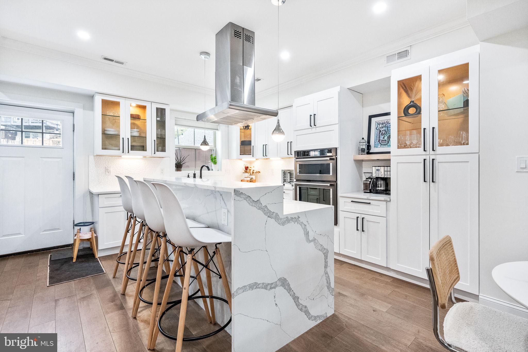 4625 4th Street Northwest Washington, DC 20011 - Photo 9 of 41 a dining room with furniture and wooden floor