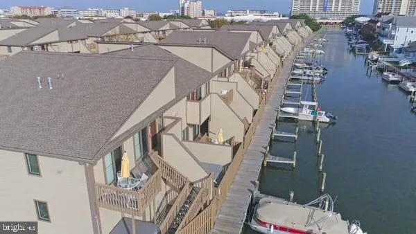 an aerial view of a house with wooden floor