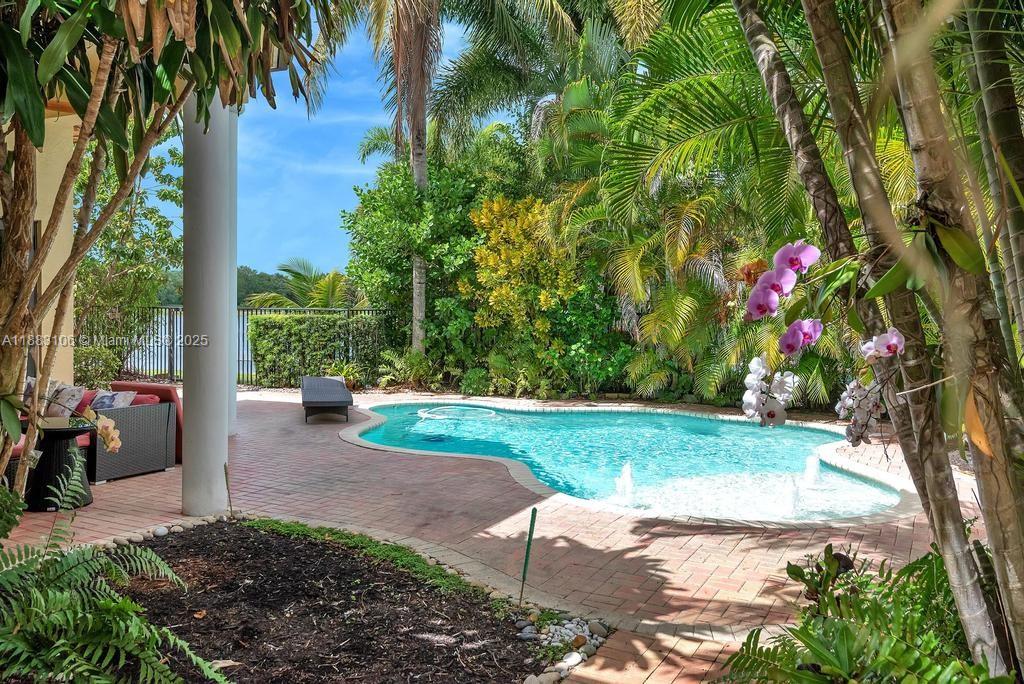 17931 Lake Azure Way Boca Raton, FL 33496 - Photo 1 of 59 a view of a backyard with garden