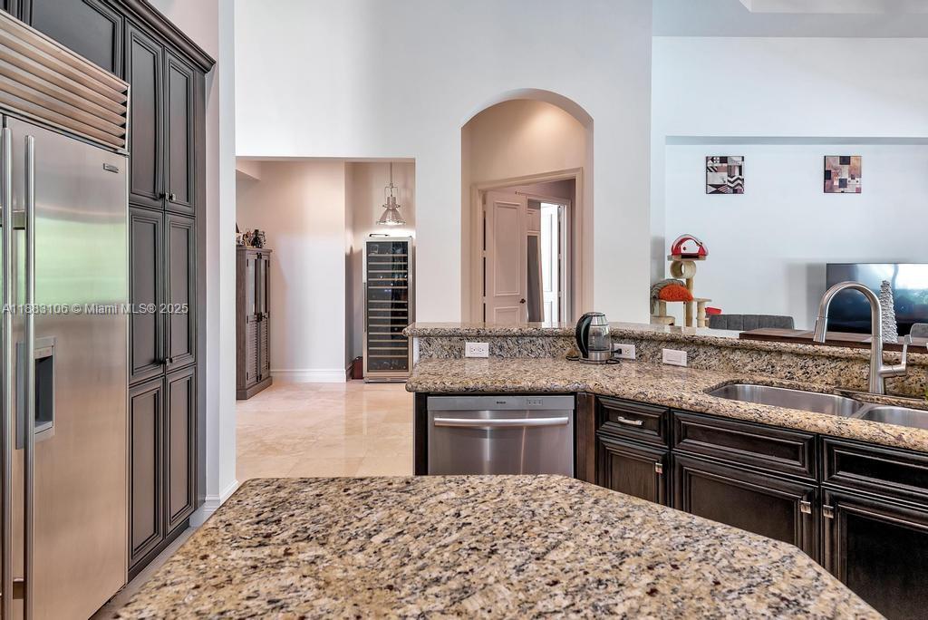 17931 Lake Azure Way Boca Raton, FL 33496 - Photo 17 of 59 a en suite bathroom with a granite countertop sink and a mirror