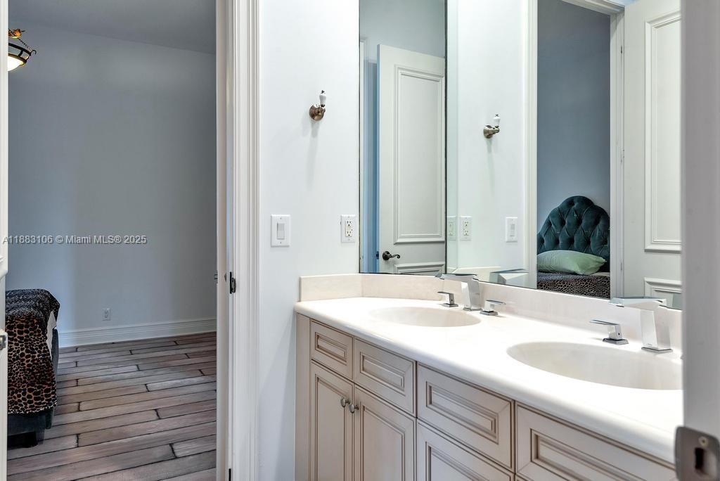 17931 Lake Azure Way Boca Raton, FL 33496 - Photo 39 of 59 a bathroom with a sink and a mirror