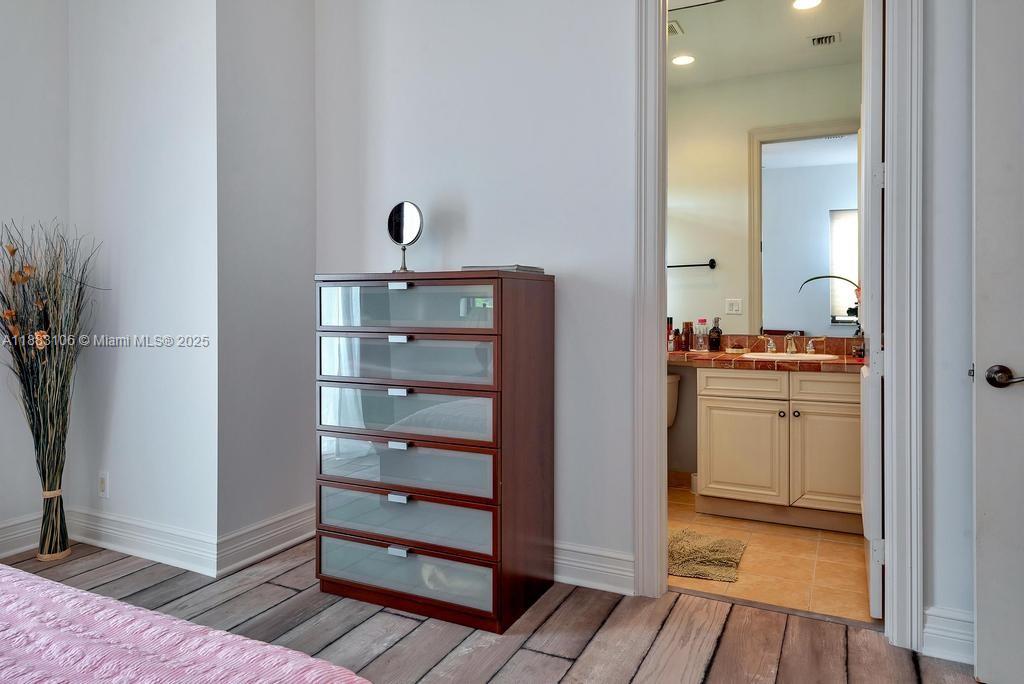 17931 Lake Azure Way Boca Raton, FL 33496 - Photo 44 of 59 a view of walk in closet with empty racks