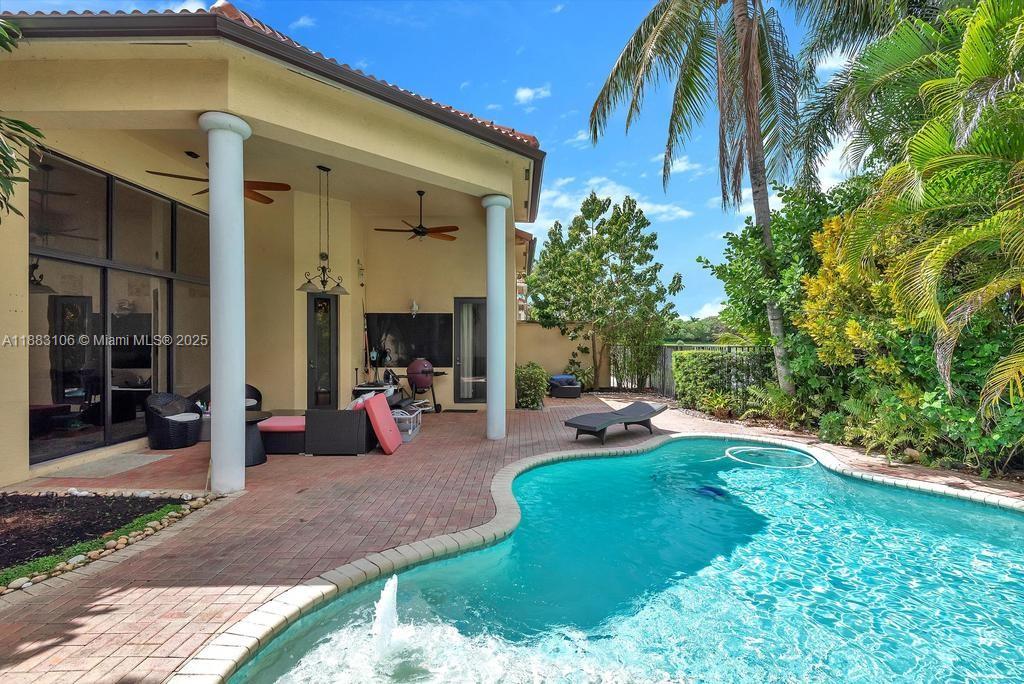 17931 Lake Azure Way Boca Raton, FL 33496 - Photo 52 of 59 a view of a house with backyard porch and sitting area