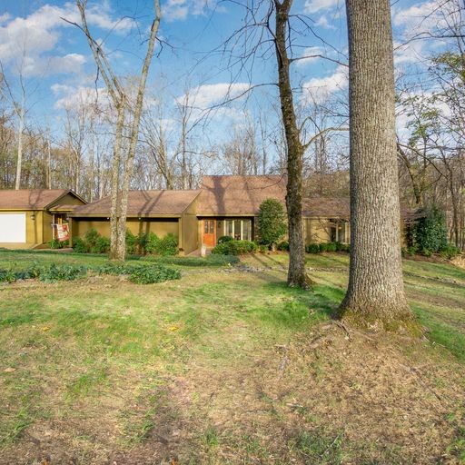 816 High Point Ridge Road Franklin, TN 37069 - Photo 5 of 40 a view of a house with backyard and tree