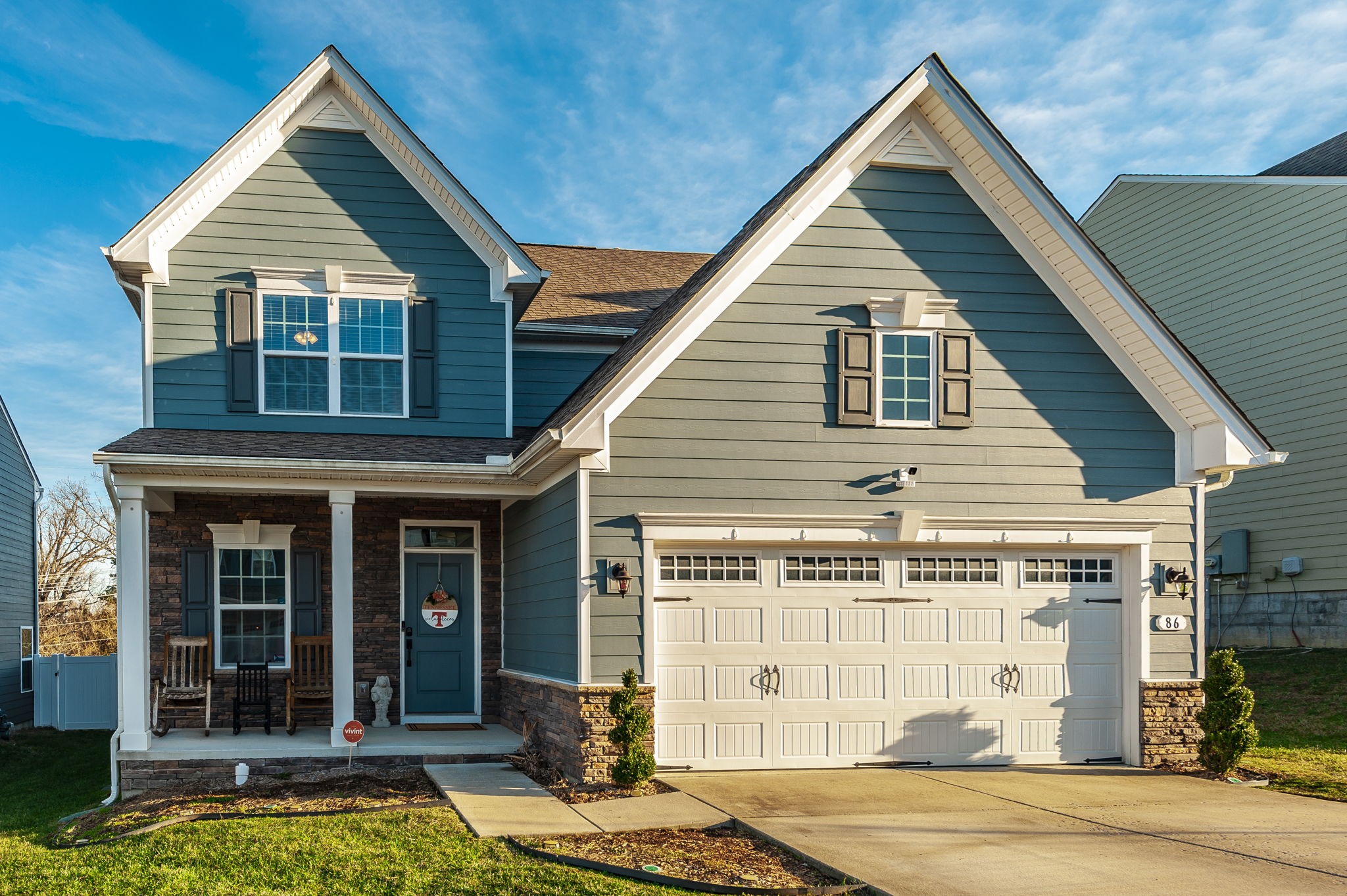 a view of a house with entrance gate