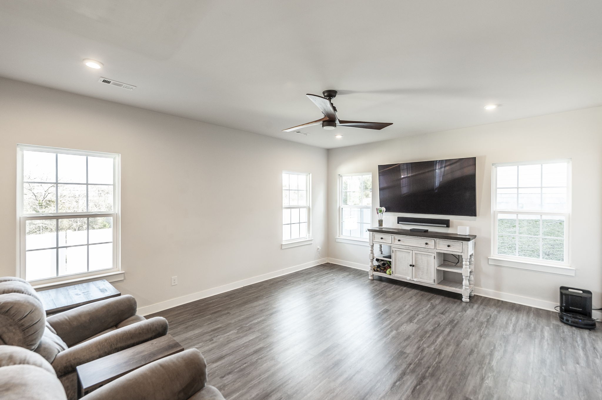 86 French Street Goodlettsville, TN 37072 - Photo 7 of 32 a living room with furniture and a flat screen tv