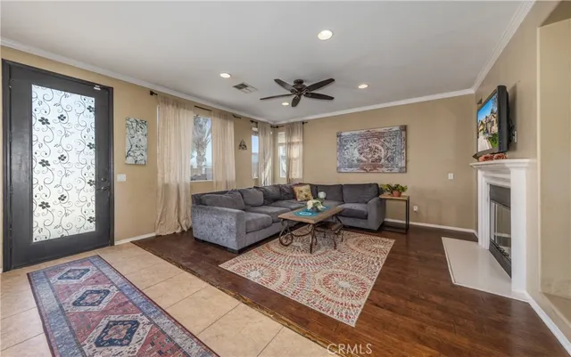 a living room with furniture and a rug