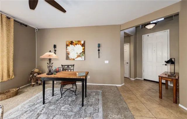 a view of a workspace with furniture