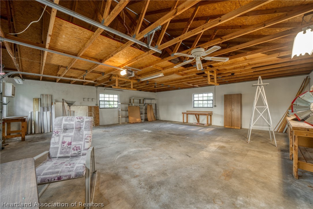 5802 Golden Road Sebring, FL 33875 - Photo 33 of 37 a view of a room with wooden floor