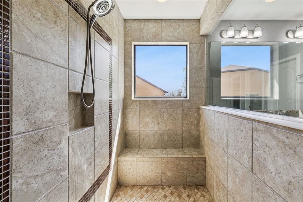 2541 Red Berry Way Ocoee, FL 34761 - Photo 24 of 49 a bathroom with a shower