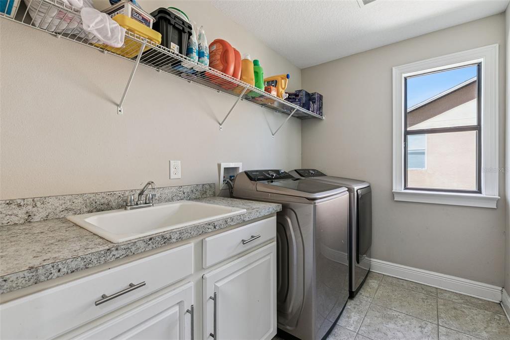 2541 Red Berry Way Ocoee, FL 34761 - Photo 28 of 49 a utility room with dryer and washer